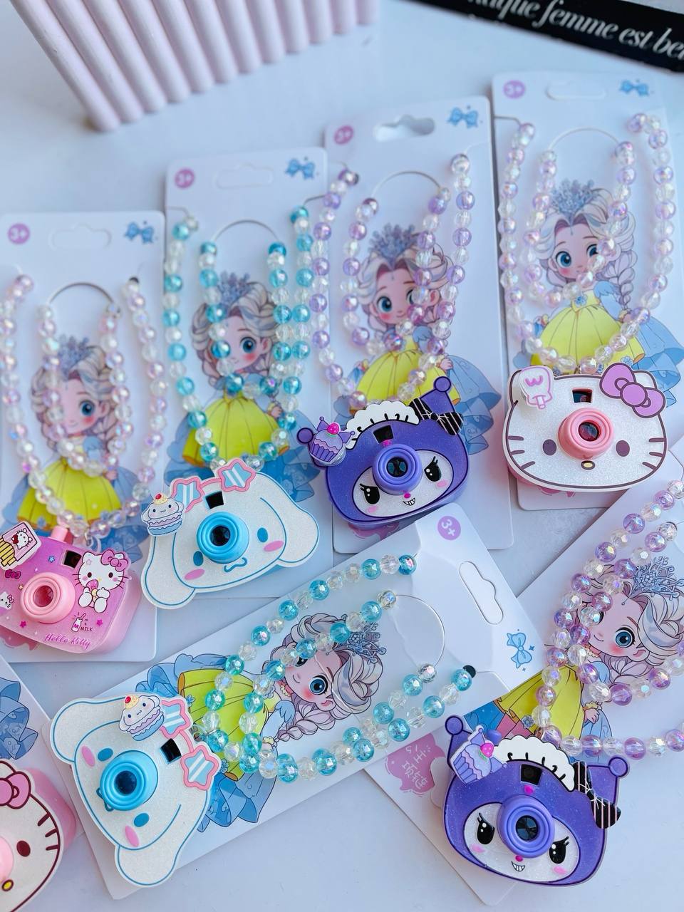 گردنبند فانتزی بچگانه دوربین دار (7) 3 طرح کرومی و ملودی و کیتی گردنبند بچگانه دخترانه فانتزی دوربین دار